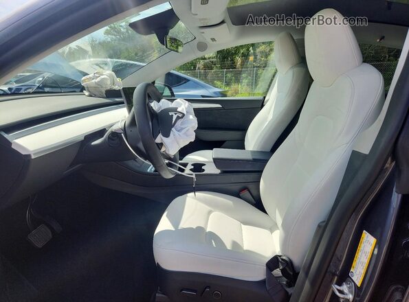 7SAYGDEE1PA195340 2023 TESLA MODEL Blue Вид салону спереду