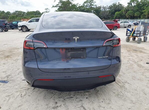 7SAYGDEE1PA195340 2023 TESLA MODEL Blue Вид ззаду