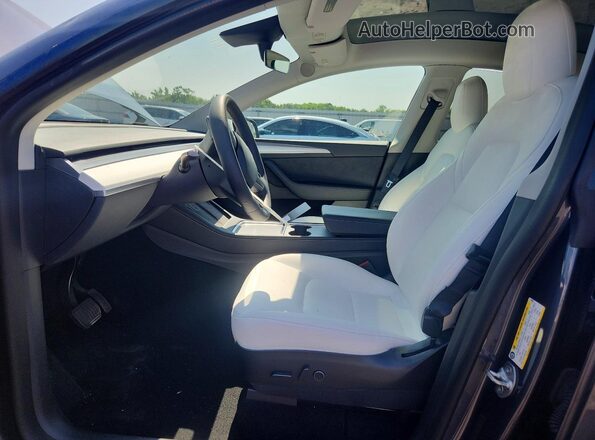 7SAYGDEE1PF594865 2023 TESLA MODEL Gray წინა სალონის ხედი