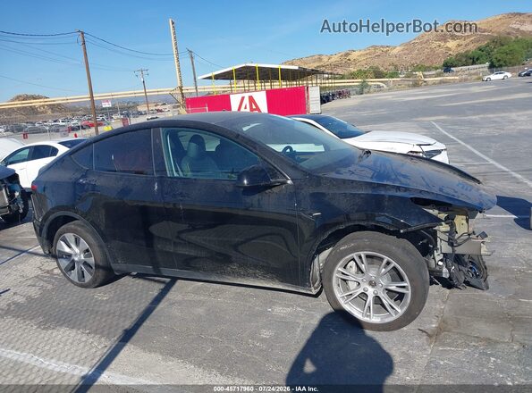 7SAYGDEE1PF802596 2023 TESLA MODEL Y Black უკანა სალონის ხედი