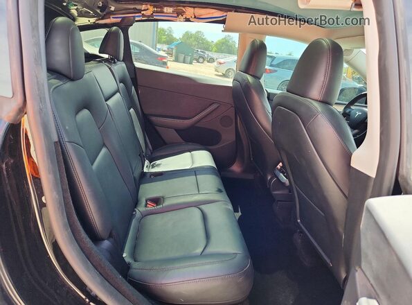 7SAYGDEE1RA215900 2024 TESLA MODEL Black უკანა სავარძლების ხედი