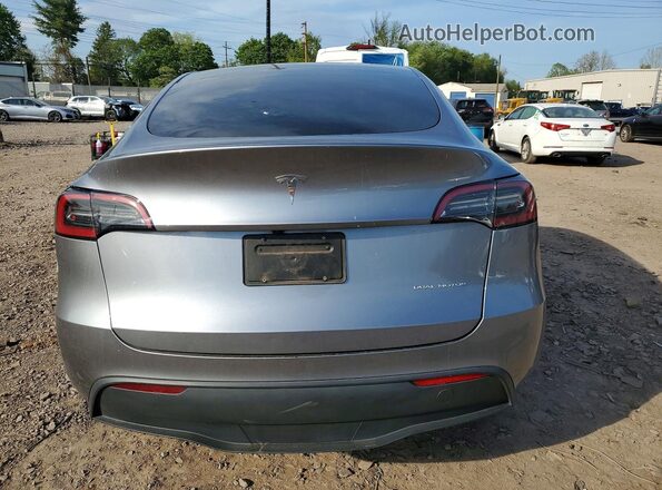 7SAYGDEE1RA301014 2024 TESLA MODEL Gray უკანა ხედი