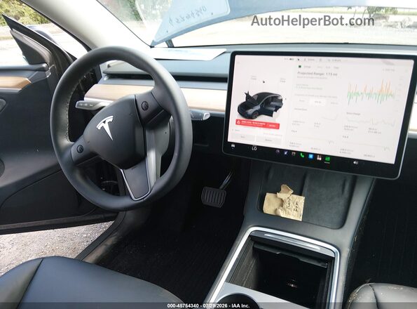 7SAYGDEE1RA329265 2024 TESLA MODEL Y Gray Vista interior delantera