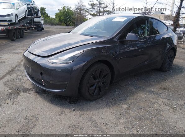 7SAYGDEE1RA329265 2024 TESLA MODEL Y Gray Vista tres cuartos delantera izquierda
