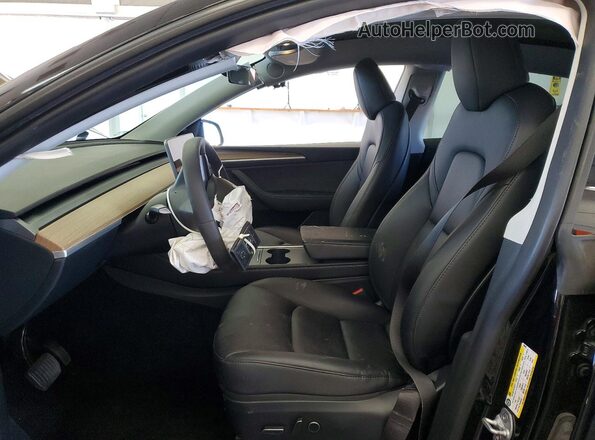 7SAYGDEE1RF990507 2024 TESLA MODEL Black Front interior view