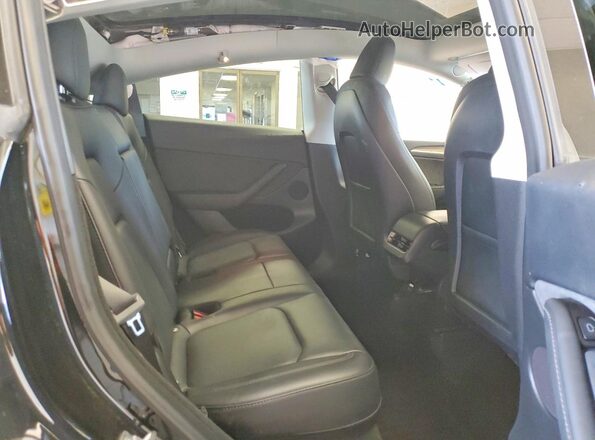 7SAYGDEE1RF990507 2024 TESLA MODEL Black Rear seats view