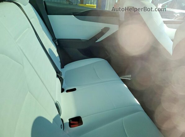 7SAYGDEE1TF336307 2026 TESLA MODEL White Vista de los asientos traseros