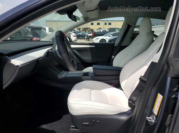 7SAYGDEE2PA211609 2023 TESLA MODEL Gray Front interior view