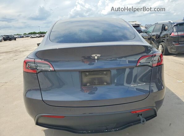 7SAYGDEE2PA211609 2023 TESLA MODEL Gray Rear view
