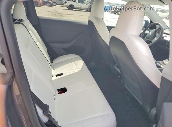 7SAYGDEE2PA211609 2023 TESLA MODEL Gray Rear seats view