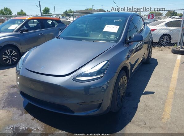 7SAYGDEE2PF840550 2023 TESLA MODEL Y Gray Vista tres cuartos delantera izquierda