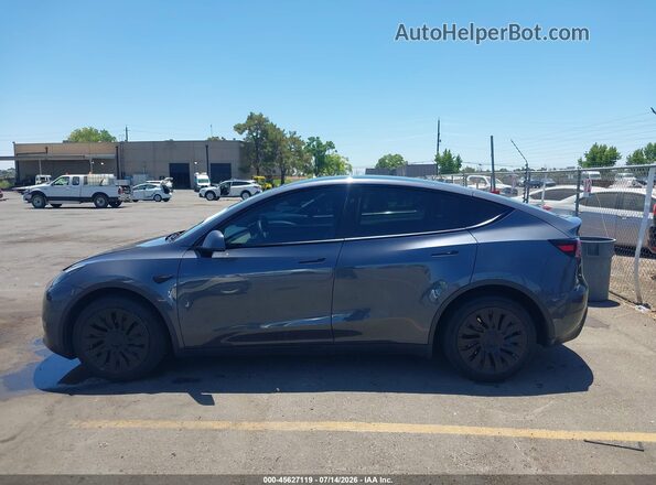 7SAYGDEE2PF840550 2023 TESLA MODEL Y Gray Vista interior trasera