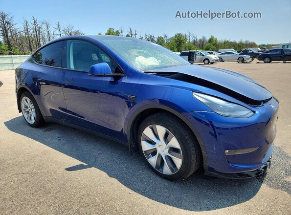 7SAYGDEE2PF887397 2023 TESLA MODEL Синий Передняя правая четверть