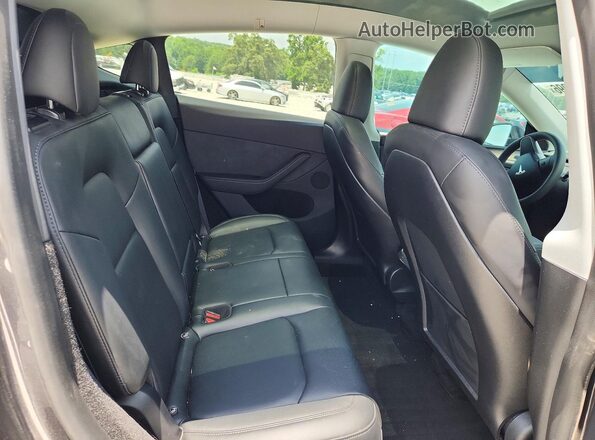 7SAYGDEE2RA222449 2024 TESLA MODEL Gray Vista de los asientos traseros