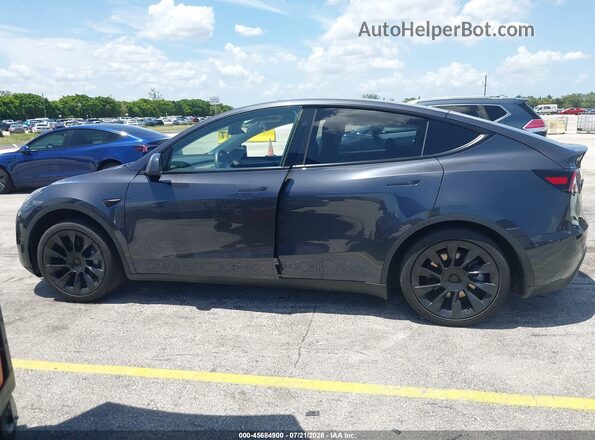 7SAYGDEE2RA255659 2024 TESLA MODEL Y Gray უკანა სალონის ხედი