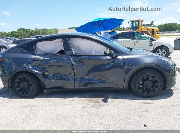 7SAYGDEE2RA255659 2024 TESLA MODEL Y Gray ხელსაწყოთა პანელის ხედი