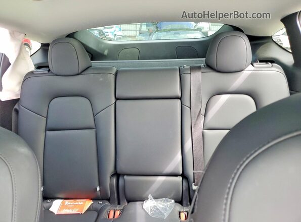 7SAYGDEE2RA328562 2024 TESLA MODEL White Rear seats view