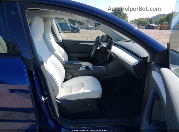 7SAYGDEE3PA090525 2023 TESLA MODEL Y Синий Вид салона спереди