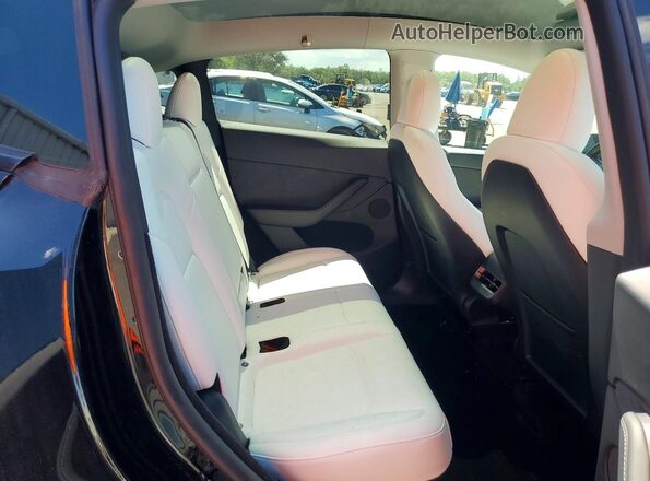 7SAYGDEE3PA183545 2023 TESLA MODEL Black Հետևի նստատեղերի տեսք