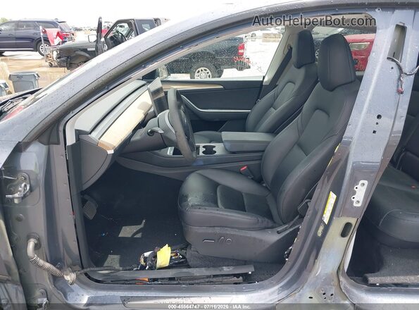 7SAYGDEE3PA184310 2023 TESLA MODEL Y Серый Вид салона спереди