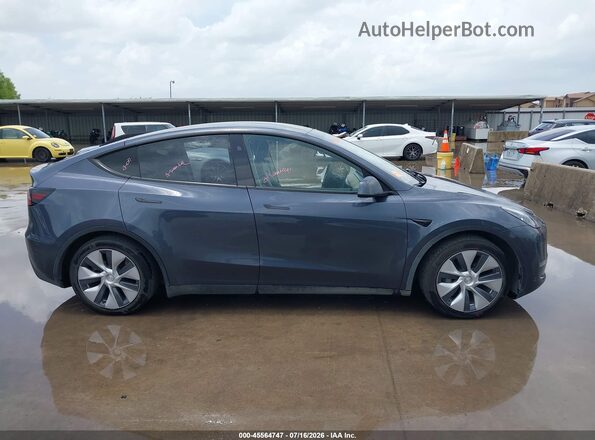 7SAYGDEE3PA184310 2023 TESLA MODEL Y Серый Вид задней части салона