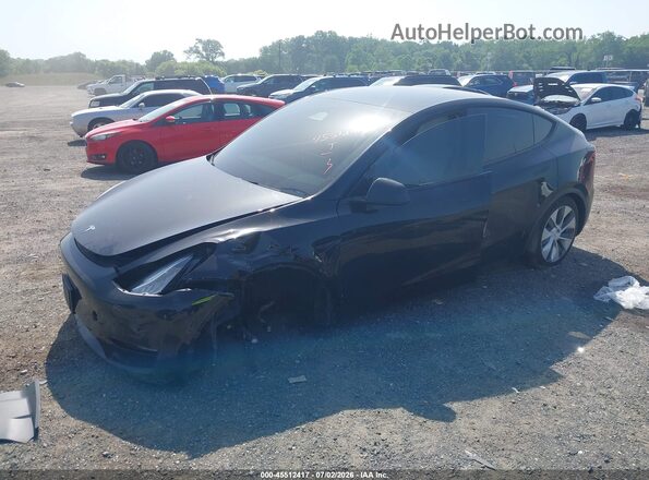 7SAYGDEE3PF591837 2023 TESLA MODEL Y Black Առջևի ձախ երեք քառորդ տեսարան
