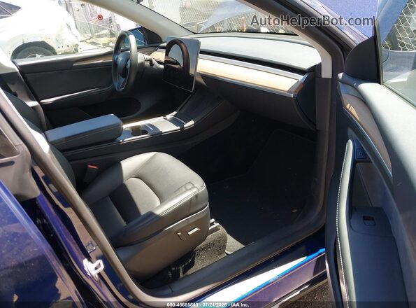 7SAYGDEE3PF854344 2023 TESLA MODEL Y Dark Blue Вид салону спереду