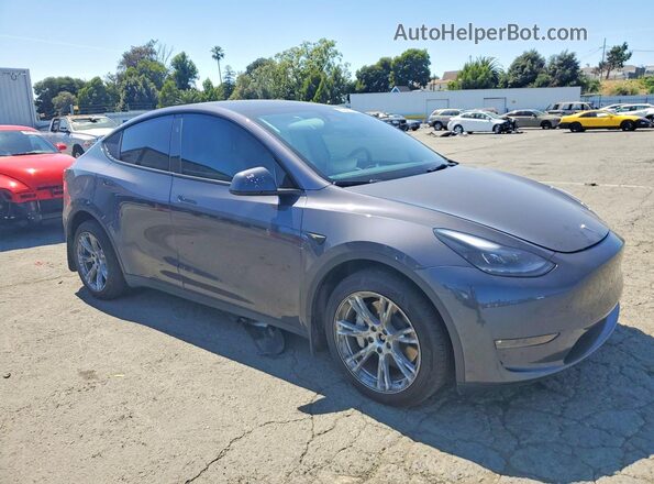 7SAYGDEE3PF873394 2023 TESLA MODEL Gray Delantero derecho