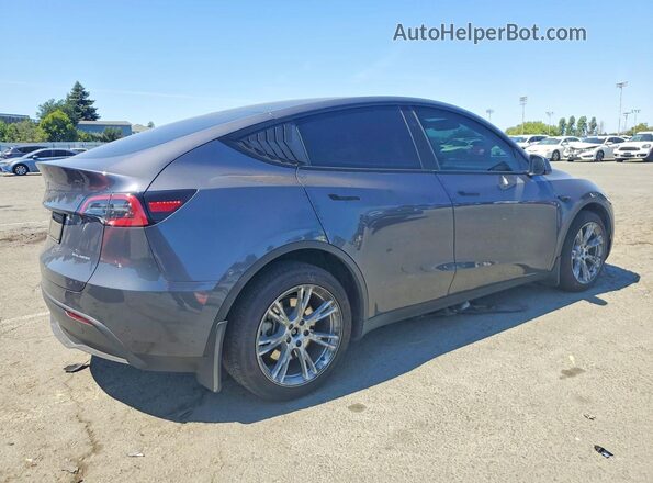 7SAYGDEE3PF873394 2023 TESLA MODEL Gray Trasero derecho