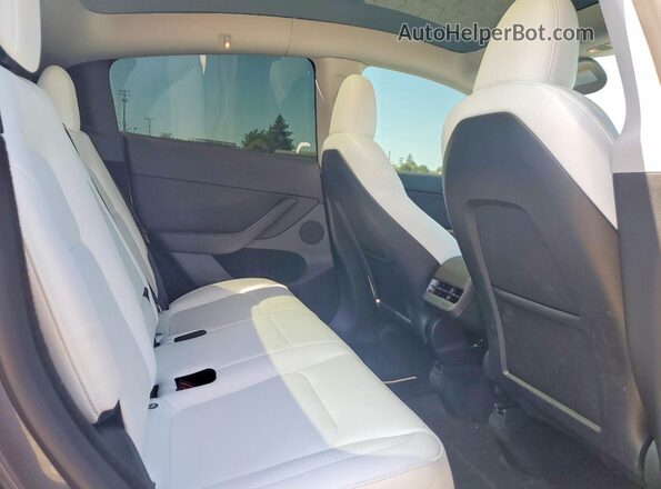 7SAYGDEE3PF873394 2023 TESLA MODEL Gray Vista de los asientos traseros