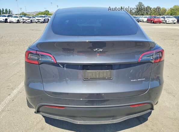 7SAYGDEE3PF873394 2023 TESLA MODEL Gray Vista trasera