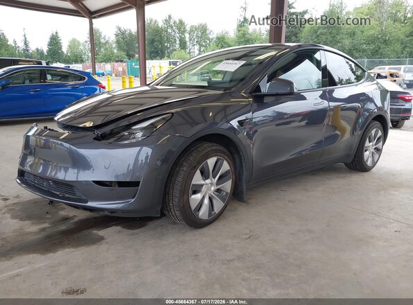 7SAYGDEE3PF921590 2023 TESLA MODEL Y Gray Przód lewy