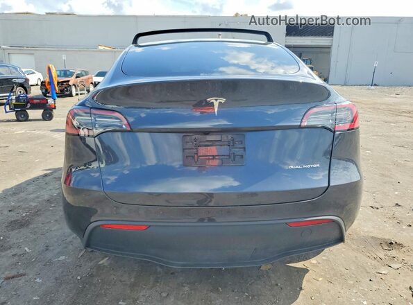7SAYGDEE3RA263446 2024 TESLA MODEL Gray Հետևի տեսք