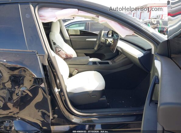 7SAYGDEE3RF004443 2024 TESLA MODEL Y Black Սալոնի դիմացի տեսք