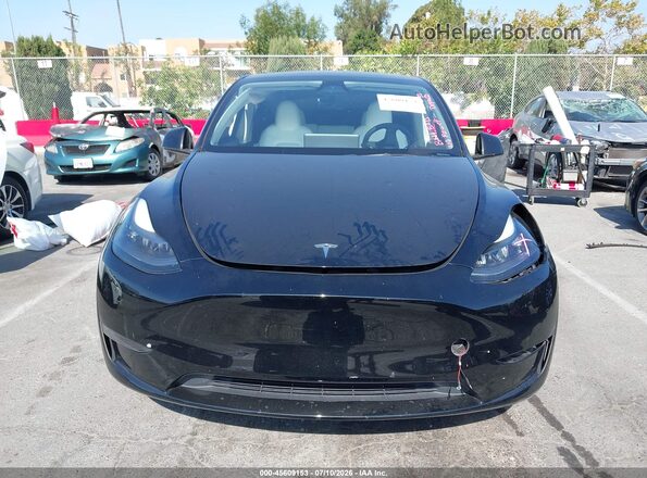 7SAYGDEE3RF004443 2024 TESLA MODEL Y Black Սալոնի հետևի տեսք