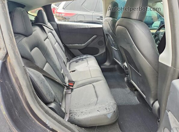 7SAYGDEE3SA361432 2025 TESLA MODEL Black Vista interior trasera