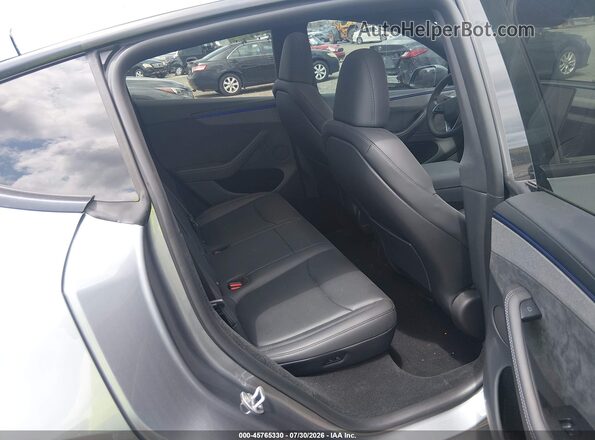 7SAYGDEE3TA636945 2026 TESLA MODEL Y Gray VIN კოდის სტიკერის ხედი