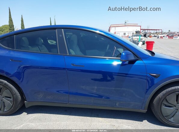 7SAYGDEE3TF455184 2026 TESLA MODEL Y Blue Widok wnętrza z tyłu