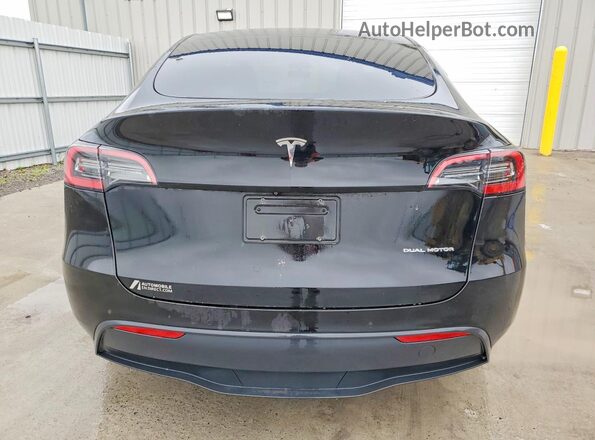 7SAYGDEE4NF385486 2022 TESLA MODEL Black Rear view