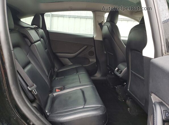 7SAYGDEE4NF385486 2022 TESLA MODEL Black Rear seats view