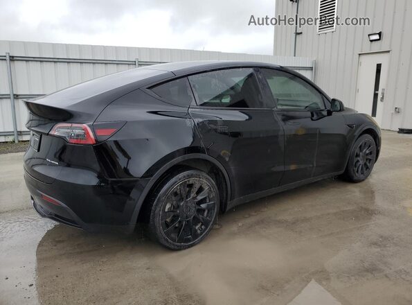 7SAYGDEE4NF385486 2022 TESLA MODEL Black 