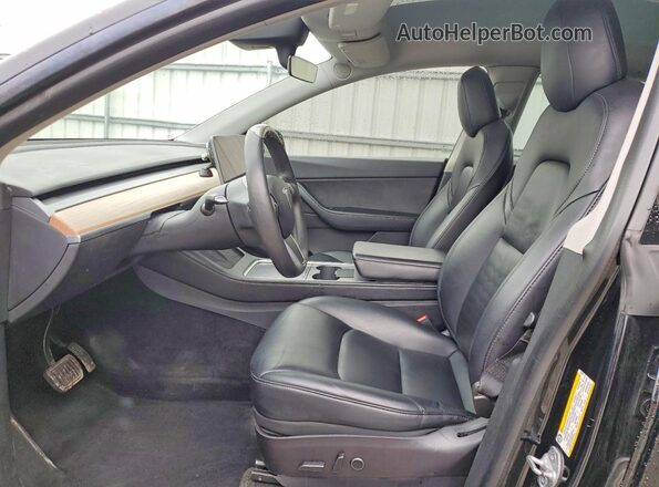 7SAYGDEE4NF385486 2022 TESLA MODEL Black Front interior view