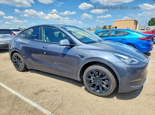 7SAYGDEE4PA050468 2023 TESLA MODEL Gray Front right