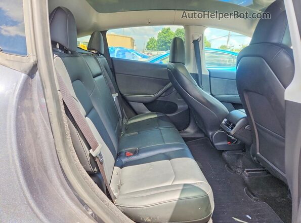7SAYGDEE4PA050468 2023 TESLA MODEL Gray Rear seats view