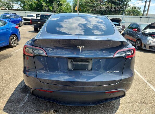7SAYGDEE4PA050468 2023 TESLA MODEL Gray Rear view