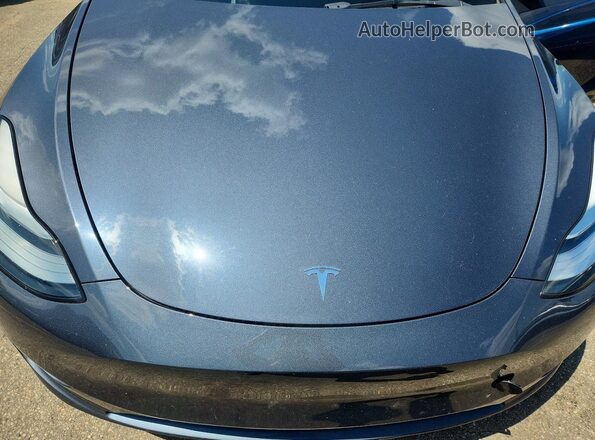 7SAYGDEE4PA050468 2023 TESLA MODEL Gray Rear interior view