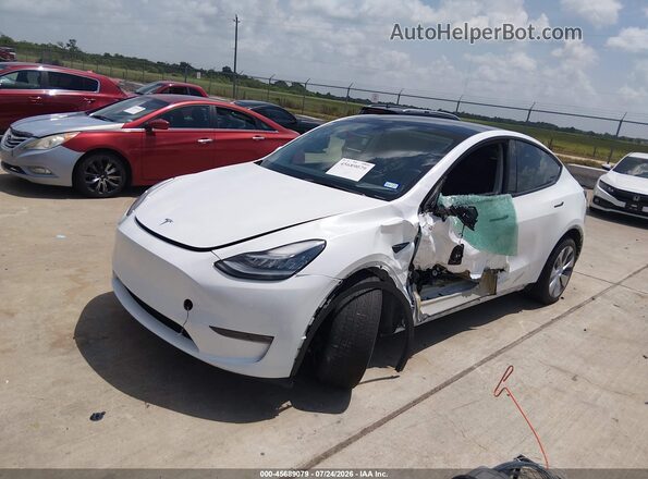 7SAYGDEE4PA119532 2023 TESLA MODEL Y White Vista tres cuartos delantera izquierda