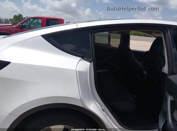 7SAYGDEE4PA119532 2023 TESLA MODEL Y White Vista de la etiqueta del VIN