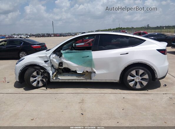 7SAYGDEE4PA119532 2023 TESLA MODEL Y White Vista interior trasera