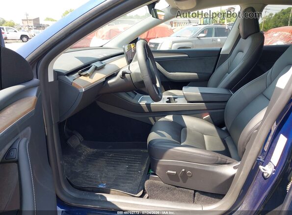 7SAYGDEE4PA125959 2023 TESLA MODEL Y Dark Blue Вид салону спереду